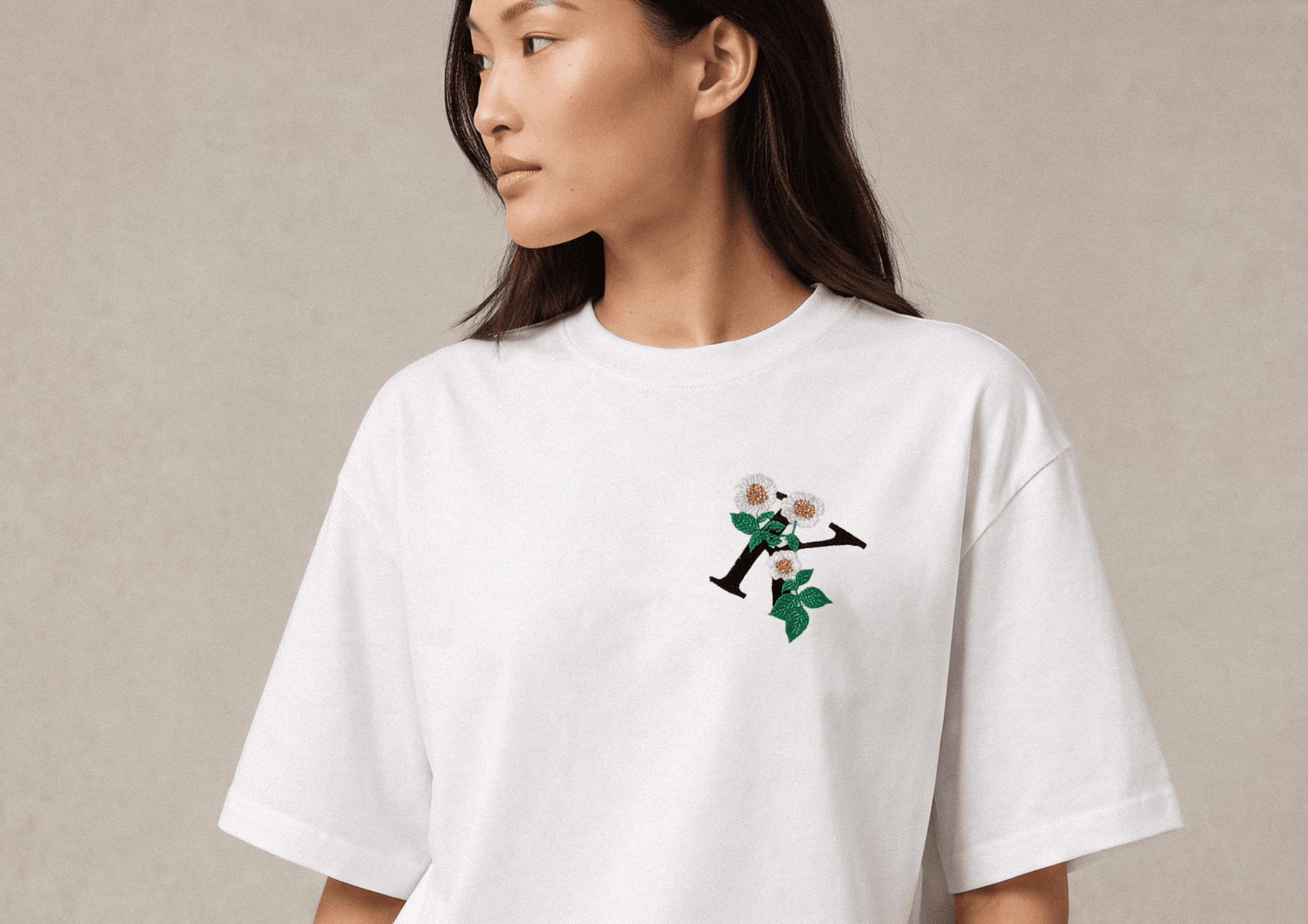 Custom embroidery on apparel — flat and 3D puff stitching detail