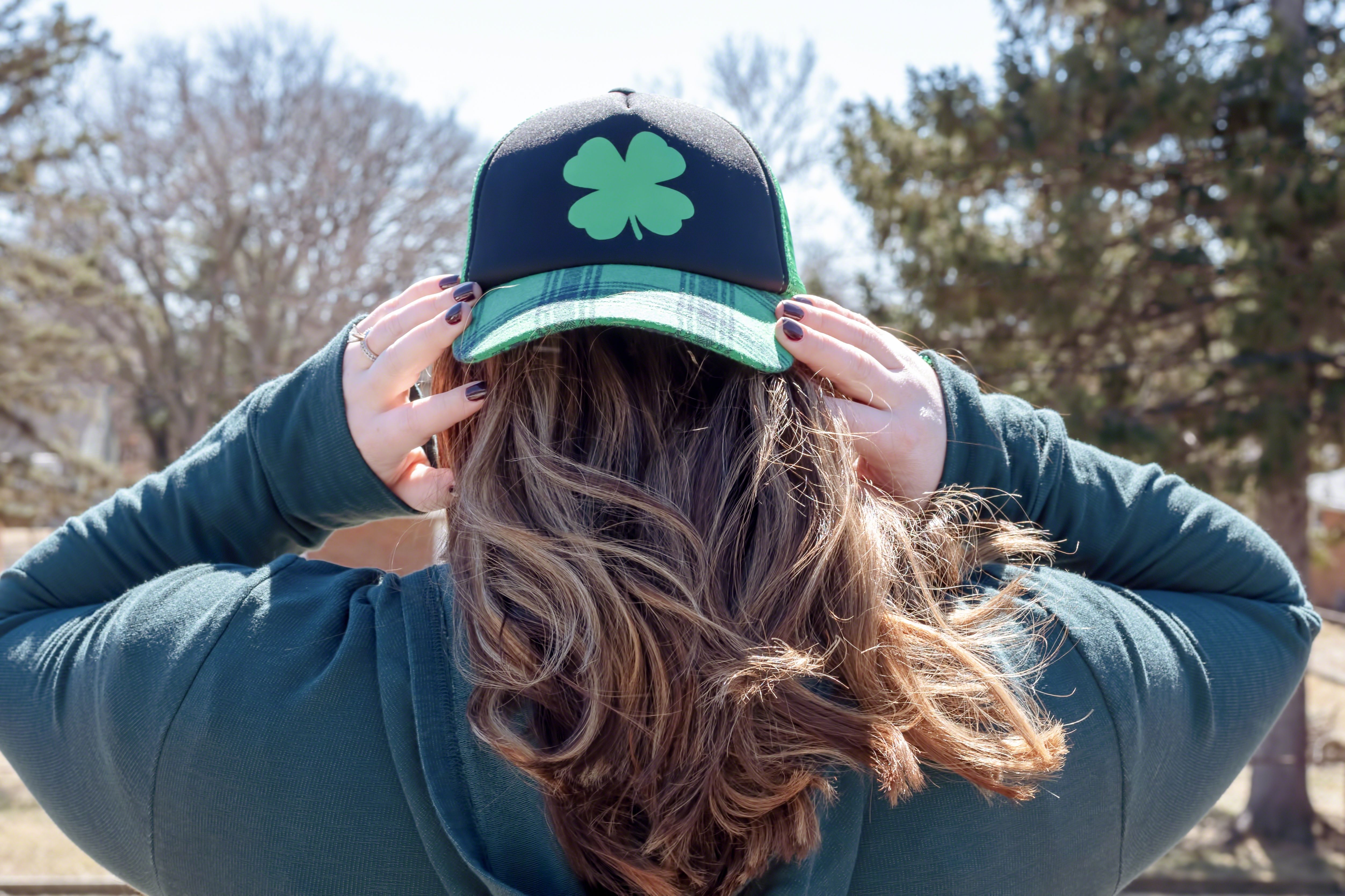 Custom embroidered cap worn — stitched design on a structured front panel